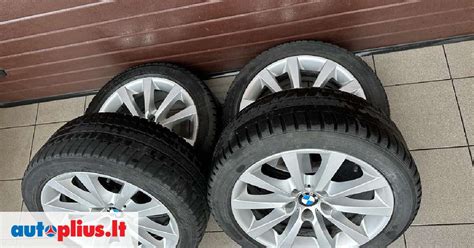BMW automobilio ratas su pusašiu