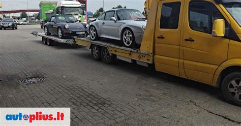 automobilio gabenimas tralu