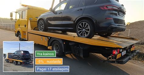 Automobilio pakrovimas ant tralo