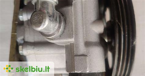 Nissan Primera vairo stiprintuvo skysčio rezervuaras