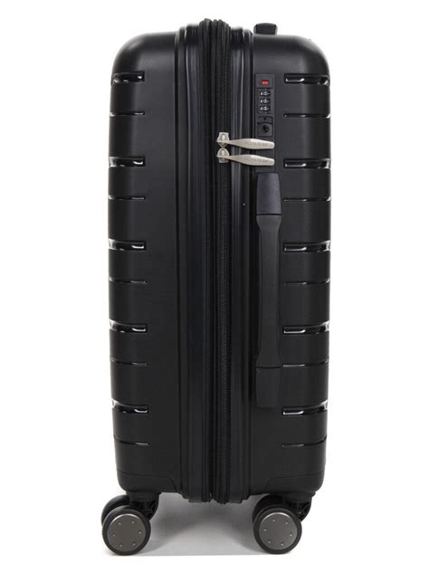 Kelioninis lagaminas ir lėktuvas