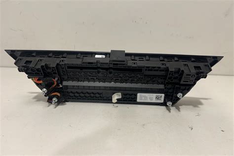 Simboliai klimato kontrolės skydelyje