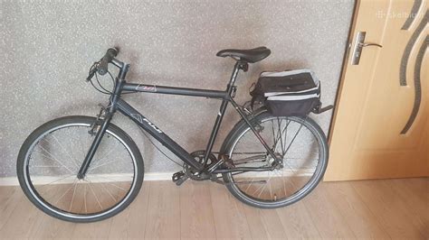 Miesto dviratis su bagažine